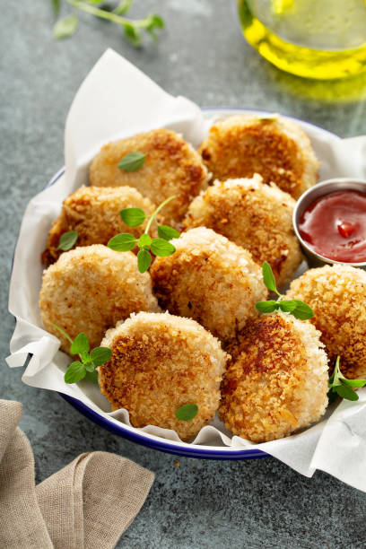 istock Chicken or fish patties with ketchup 1325962040