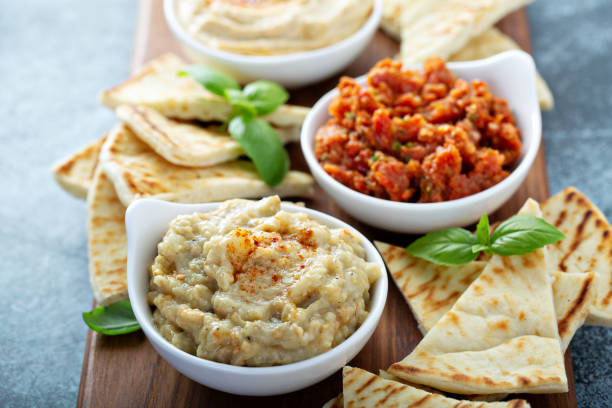 istock Mezze board with pita and dips 1325962068