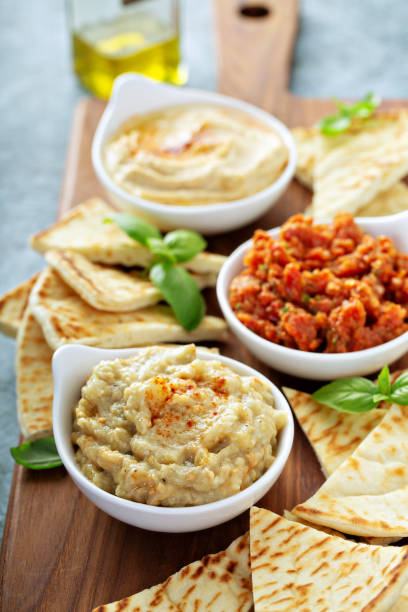 istock Mezze board with pita and dips 1325962094