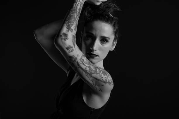 istock Beautiful Tattooed Young Woman 1325962944