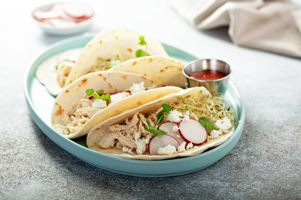 istock Healthy tacos with shredded chicken 1325963088