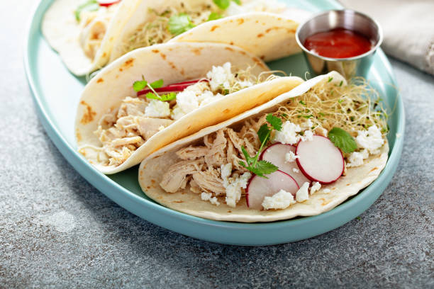 istock Healthy tacos with shredded chicken 1325963091