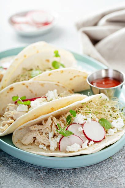 istock Healthy tacos with shredded chicken 1325963092