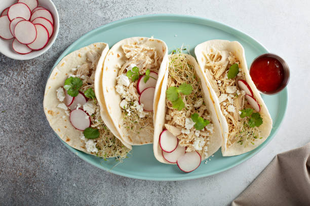 istock Healthy tacos with shredded chicken 1325963096