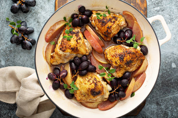 istock Chicken thighs roasted with grapes and apples 1325963180