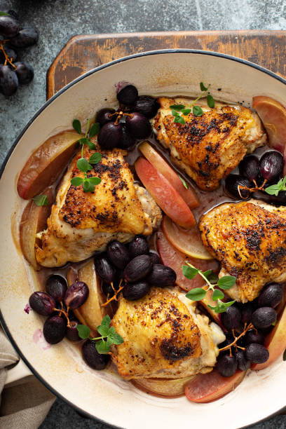istock Chicken thighs roasted with grapes and apples 1325963185