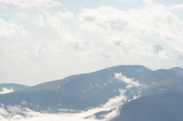 istock Fog on a mountain range in the Carpathian mountains 1325963223