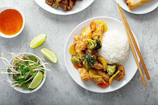 Orange chicken with vegetables and white rice