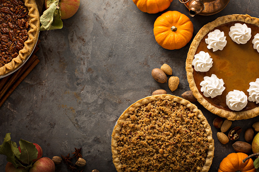 Traditional Thanksgiving pies with copy space overhead view