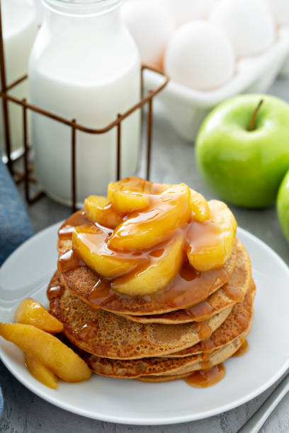 istock Pancakes with apple caramel topping 1325964462