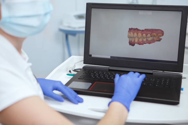 istock Female dentist working at her clinic 1325966348