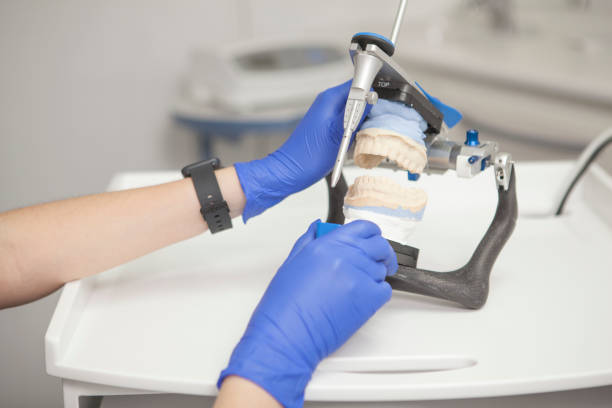 istock Female dentist working at her clinic 1325966514