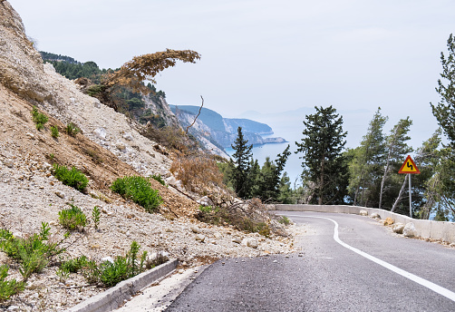 Landslide caused by earthquake blocking the mountain road at Lefkada island.