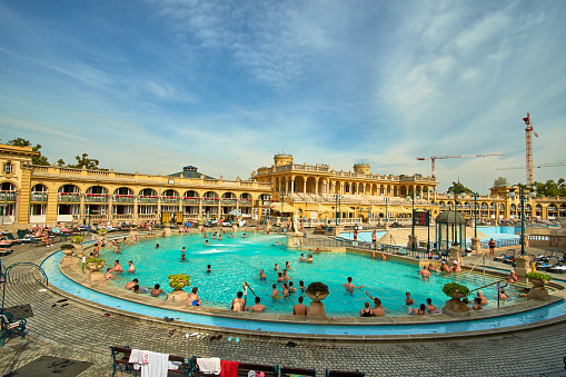 BUDAPEST, HUNGARY - MAY 02,2019: Courtyard of Szechenyi Baths, Hungarian thermal bath complex and spa treatments.