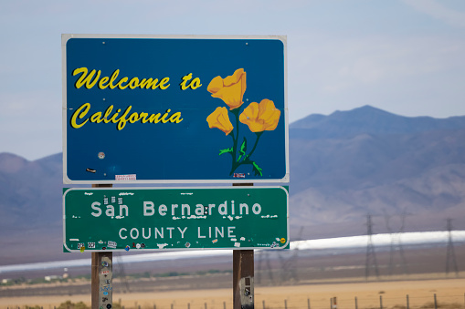 Ivanpah Valley - California, USA - June 22, 2021The San Bernardino County Line Sign from Nevada to California. This sign is seen by many drivers making the trip from Las Vegas, NV to Los Angeles, CA