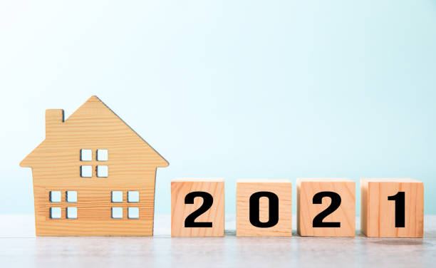 istock Wooden houses model with 2021 1325970153