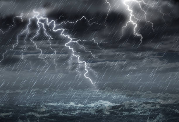 Extreme Weather Extreme weather concept with dark storm clouds and stormy destructive winds with heavy rain in a 3D illustration style. cyclone rain stock pictures, royalty-free photos & images