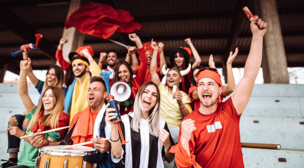 istock supporters screaming at the stadium all together 1325977090
