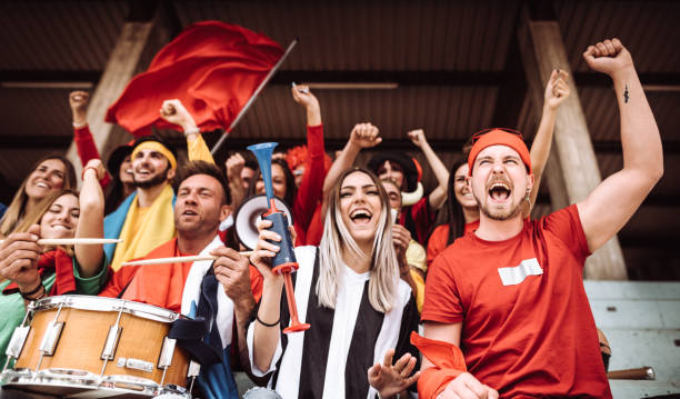 istock supporters screaming at the stadium all together 1325977158