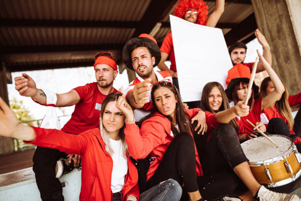 istock supporters screaming at the stadium all together 1325977964