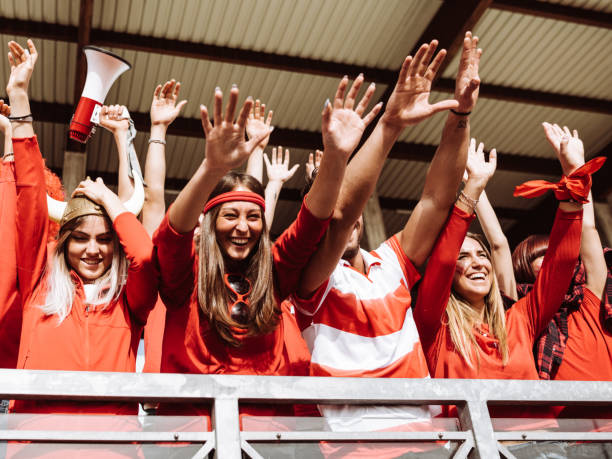istock supporters screaming at the stadium all together 1325977992