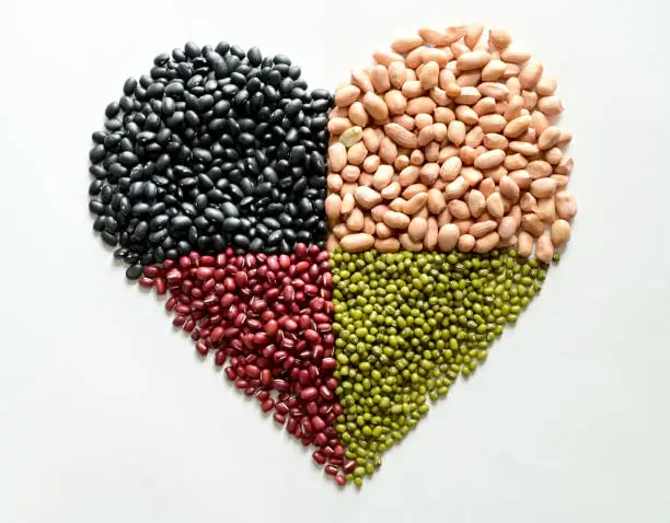 Photo of Black beans, Peanuts, Kidney Bean and Mung Bean in the shape of a heart