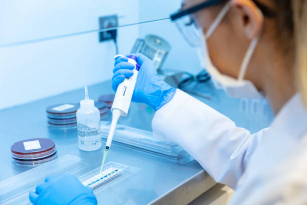 istock Female scientist analyzing covid-19 sample in the laboratory 1325980508