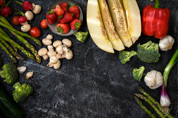 istock Vegetables background with raw fresh greenery summer ecological food. Copy space text 1325980743