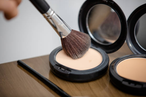 istock Makeup brush in various sizes with powder and illuminator. 1325981771