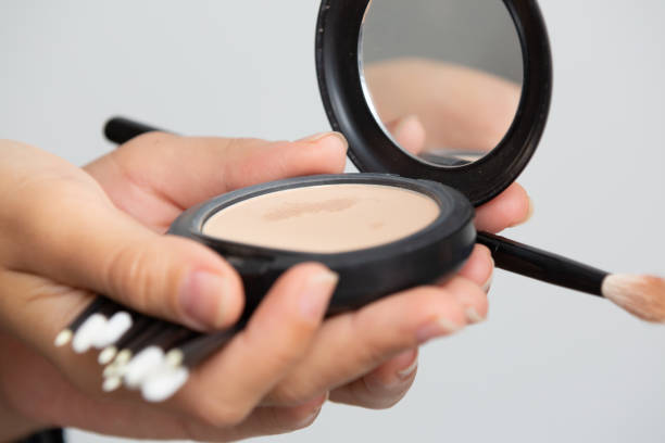 istock Makeup brush in various sizes with powder and illuminator. 1325981839