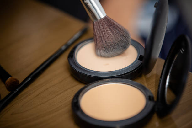 istock Makeup brush in various sizes with powder and illuminator. 1325982595