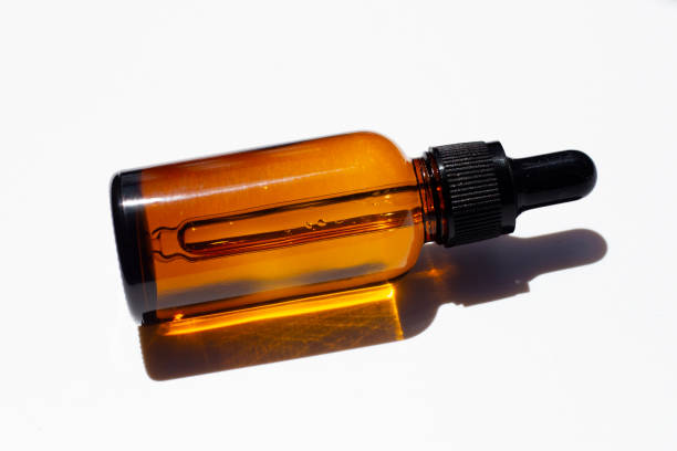 istock Brown bottle eye dropper on white background. 1325984118