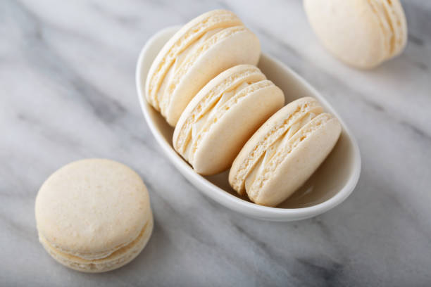 istock Vanilla macarons in a little bowl 1326004586