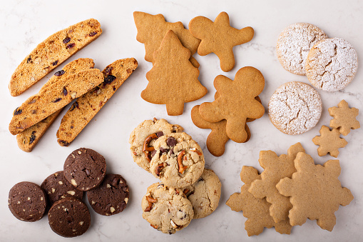 An assortment of different shapes biscuits iced and ready for Christmas