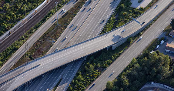 Aerial View from an Airplane of a junction at Trans-Canada Highway. Taken in Coquitlam, Vancouver, British Columbia, Canada.