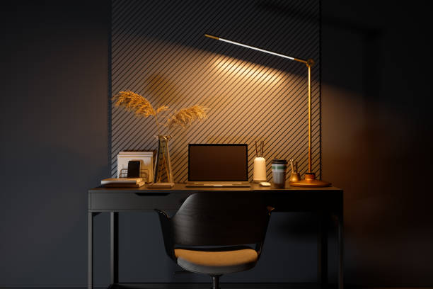 Workplace With Laptop, Note Pad And Glowing Lamp On Studying Desk At Night Workplace With Laptop, Note Pad And Glowing Lamp On Studying Desk At Night low lighting stock pictures, royalty-free photos & images
