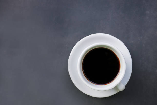 istock Crema Espresso coffee  on cup top view on white background 1326016066
