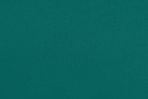 istock Blue green homogeneous background with a textured surface 1326016103