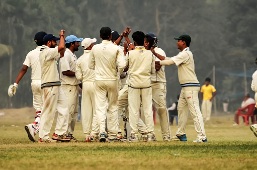 Calcutta, India - January 07, 2016: Cricket players are celebrating fall of wicket during CAB league.
