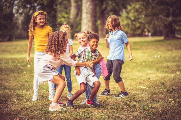 Happy children playing on field