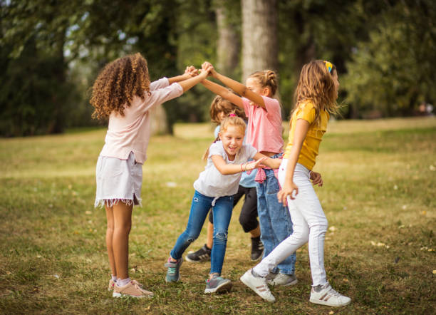 istock Happy kids in schoolyard. 1326018617