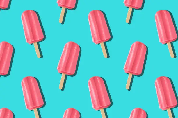 Ice cream popsicle on blue background. Seamless pattern. Summer background