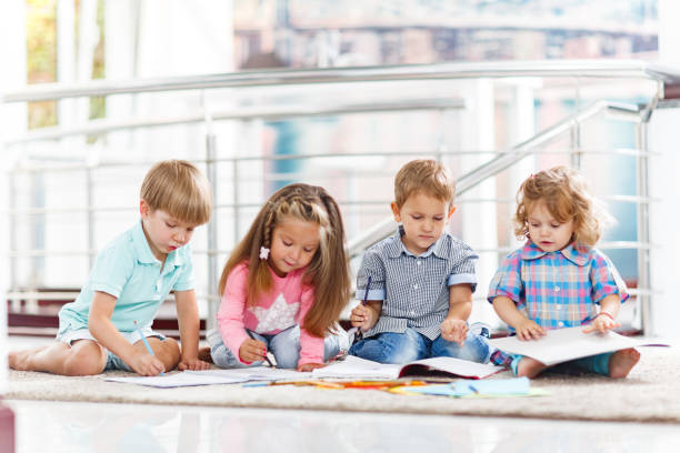 istock Small friends enjoying in creative time at home. 1326030529