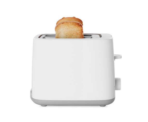 istock Electric toaster with bread slices isolated on white 1326032233