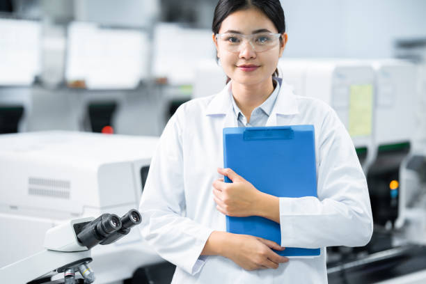 istock Laboratory technician, Asian medical technicians work in private laboratories. 1326036940