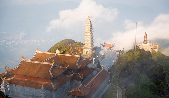 Panoramic of Kim Son Bao Thang Tu Pagoda on misty sky, at the top of mount Fanispan, Sapa region, Lao Cai, Vietnam