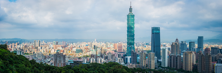 The iconic view of  Taipei downtown skyscrapers overlooking the crowded cityscape. Taiwan’s vibrant capital city.