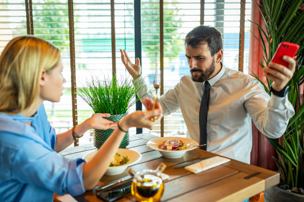 istock Beautiful Fashionable Couple in Love is Going Through Serious Relationship Problems During the Lunch at a Restaurant. 1326040241