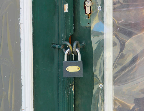 istock metal lock on closed doors 1326041122