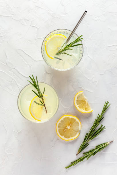 Homemade lemonade Lemonade in glasses on the table. Top view lemonade stock pictures, royalty-free photos & images